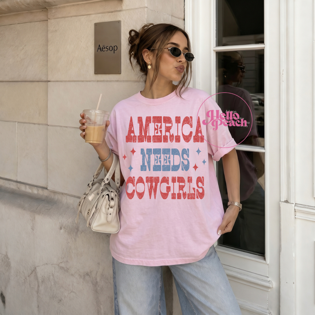 America Needs Cowgirls Tee